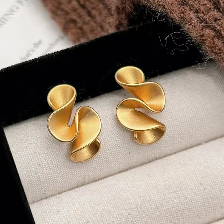 Orecchini a forma di fiore in argento sterling e oro 18K