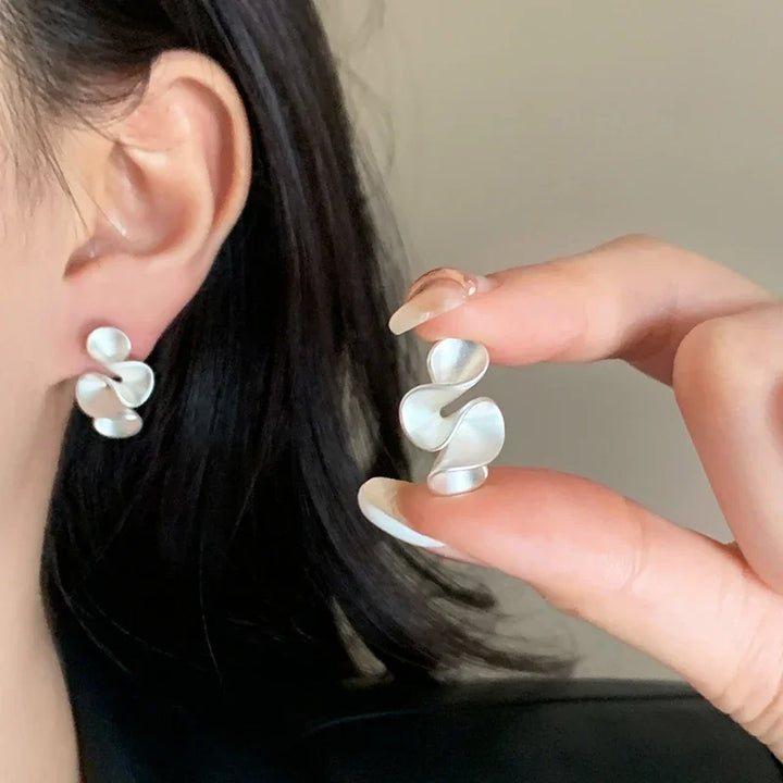 Orecchini a forma di fiore in argento sterling e oro 18K