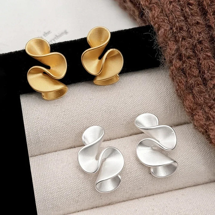 Orecchini a forma di fiore in argento sterling e oro 18K